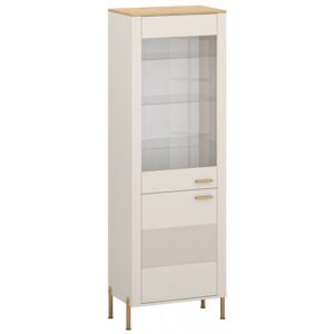 White tall storage cabinet with a glass display front two drawers and a vented panel on gold legs with a wood top Globalmtc