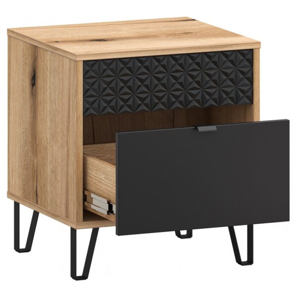 Oak toned bedside cabinet with a textured black drop front door and an open shelf beneath supported by black metal legs image shows a lower drawer partly extended Globalmtc