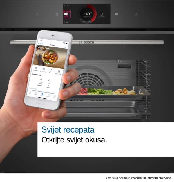 Hand holding a smartphone showing a recipe app beside a bosch oven illustrating a connected kitchen feature Globalmtc